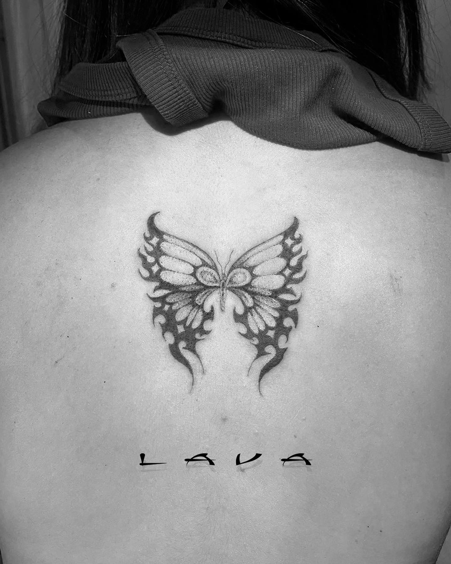 Butterfly with internal gothic tribal detail, ornamental back tattoo